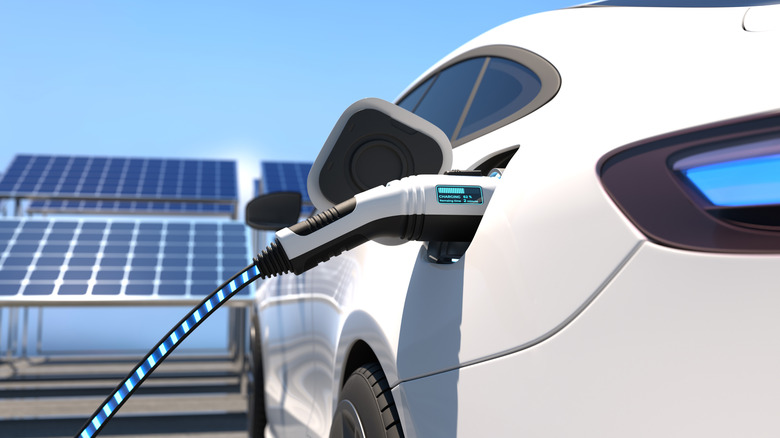 Electric car power charging, Charging technology, Clean energy filling technology. 3D illustration