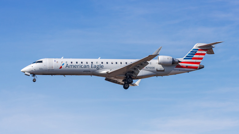  American Eagle SkyWest Airlines Bombardier CRJ700 airplane astatine Los Angeles Airport successful nan United States.