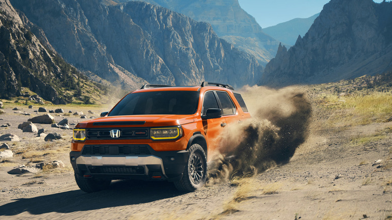 An orangish Honda Passport