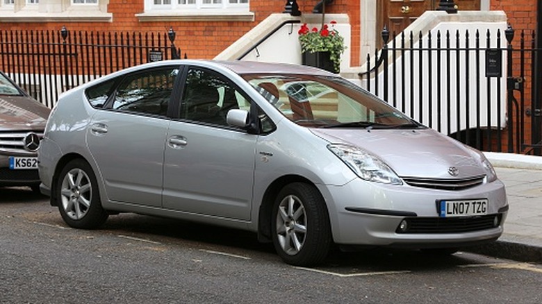 Toyota Prius hybrid hatchback compact car parked successful London, UK. There are 2.6m cars registered successful London.