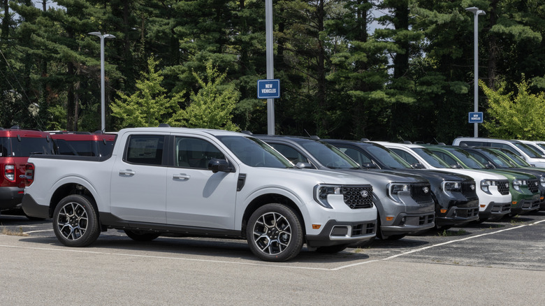 Indianapolis - August 1, 2025: Ford Maverick pickup display at a dealership. Ford offers the Maverick in XL, XLT, Lariat, Lobo, and Tremor models.