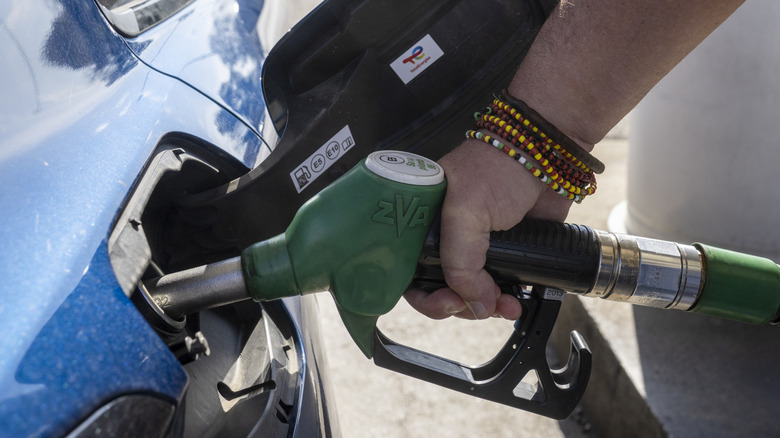 A driver is filling up at one of the gas pumps in a E.Leclerc Gas Station on August 24, 2026 in Champagnole, France.