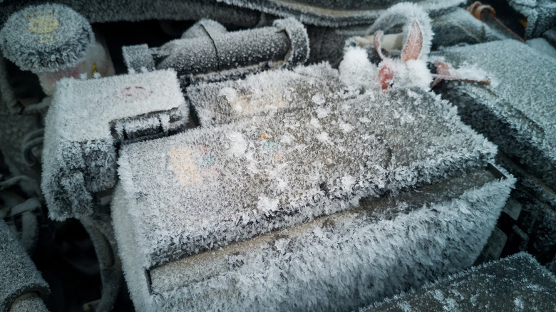 A car battery covered in frost.