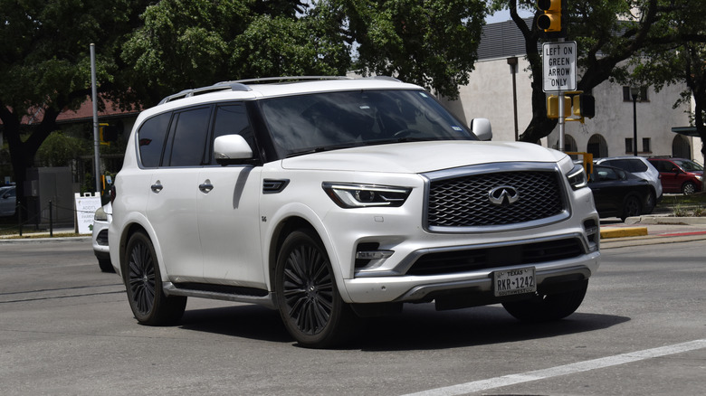 Houston, TX USA 4-18-2025 - An Infinity QX80 luxury SUV cruising in the downtown financial district.