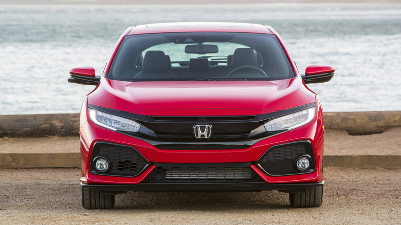 Front end of a red Honda Civic