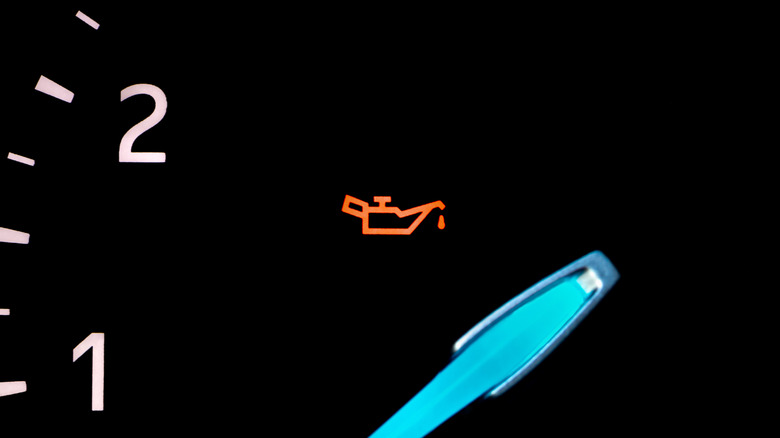 Low oil light on a dashboard.