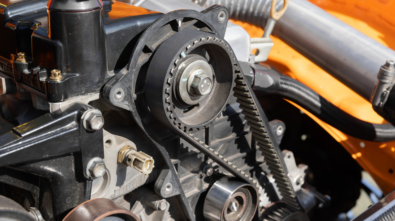 Exposed timing belt on an engine.