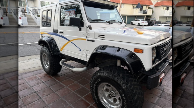 Suzuki Samurai parked on a brick parking area