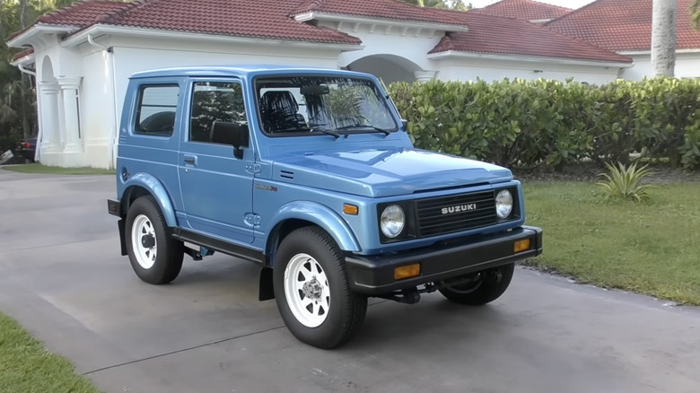 A Suzuki Samurai parked in a driveway in california