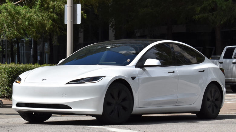 A white tesla sedan