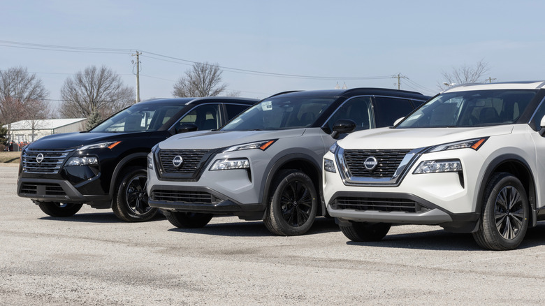 Nissan Rogue display at a dealership. Nissan offers the Rogue in S, SV, SL and Platinum models.