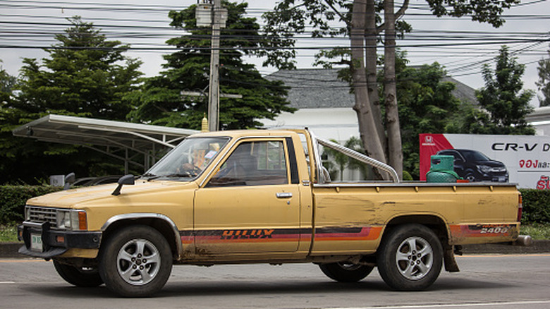 Private old Pickup car, Toyota Hilux Mighty X. On road no.1001, 8 km from Chiangmai city.