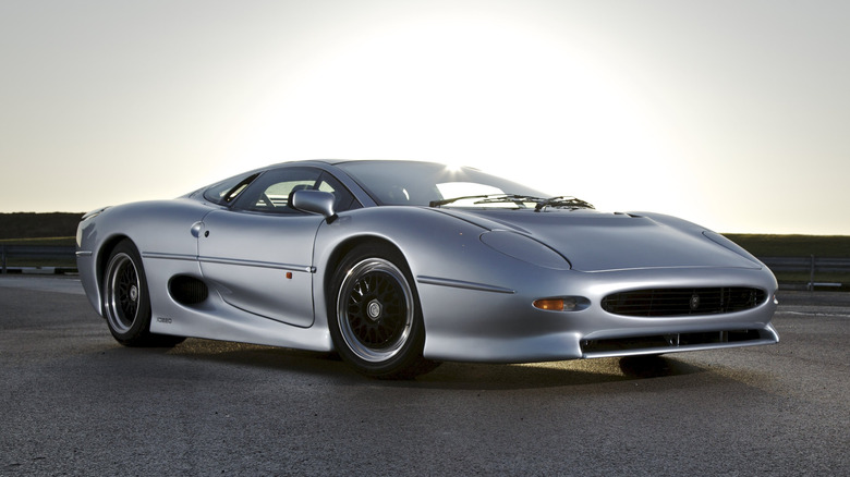Front 3/4 view of a silver Jaguar XJ220