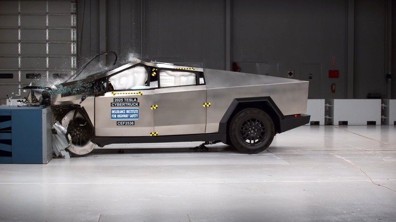A broadside position of a Cybertruck undergoing nan IIHS mean beforehand overlap clang trial nan infinitesimal it hits nan barrier