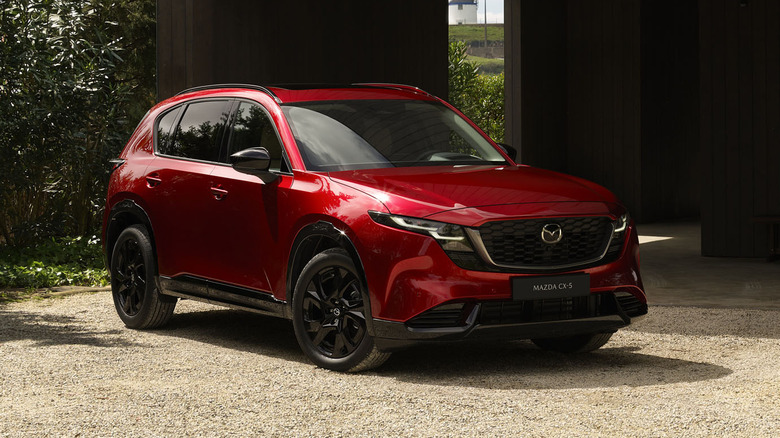 Front 3/4 view of a red Mazda CX-5