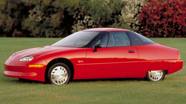 side view of a red GM EV1
