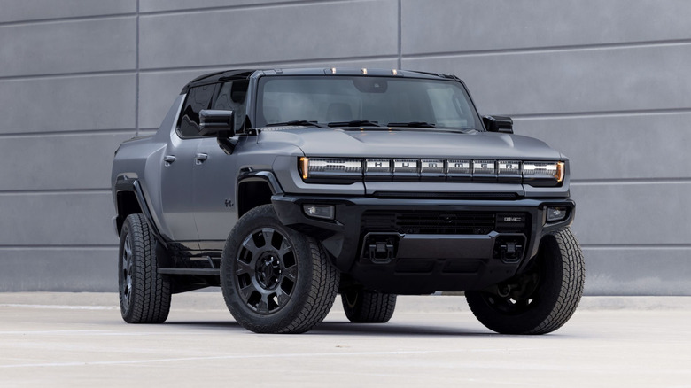 Front 3/4 view of a grey GMC Hummer EV pickup