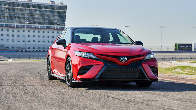 Front end of a red Toyota Camry TRD