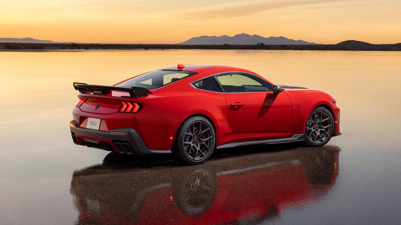 Rear 3/4 view of a red Ford Mustang Dark Horse SC