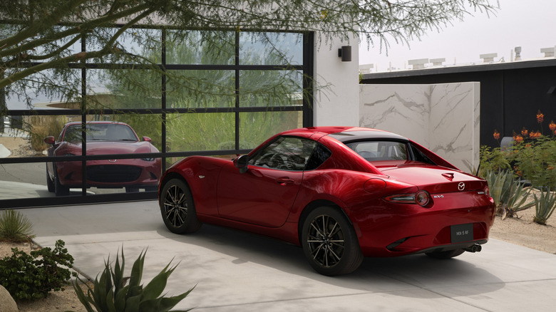 Rear 3/4 view of a red Mazda MX-5 Miata RF