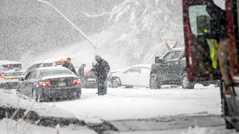Pennsylvania State Troopers handle a car accident caused by winter weather on March 7, 2018 along the Pennsylvania Turnpike in Philadelphia, Pennsylvania.