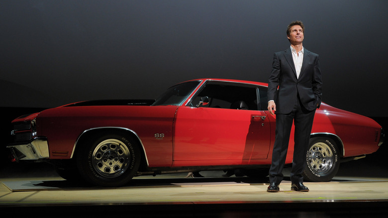 Tom Cruise stands successful beforehand of nan reddish Chevrolet Chevelle SS 396 from Jack Reacher
