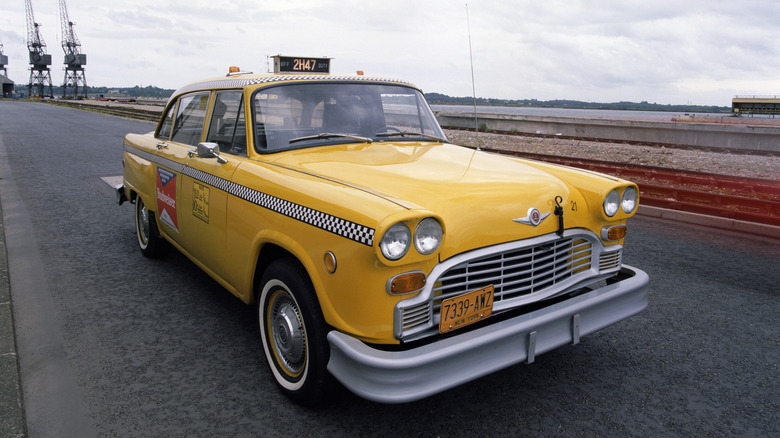 A yellow Checker New York taxicab