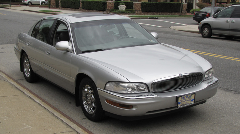 A gray 2000 Buick Park Avenue Ultra on a residential street