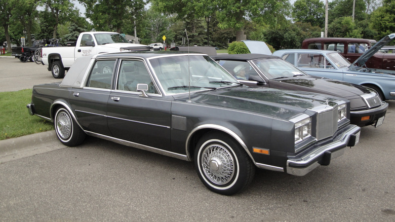 A 1984 Chrysler Fifth Avenue at a car meet