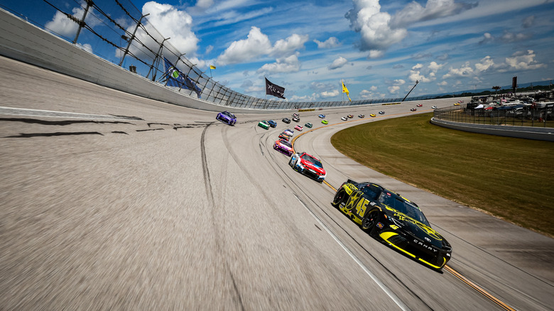 Tyler Reddick, driver of the #45 23XI Racing and Kyle Larson, driver of the #5 Valvoline lead the pack before the NASCAR Cup Series Jack Link's 500 at Talladega Superspeedway on April 26, 2026 in Talladega, Alabama.
