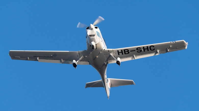 Diamond DA40 propeller plane on its final approach to runway 10 in Saint Gallen, Altenrhein, Switzerland,