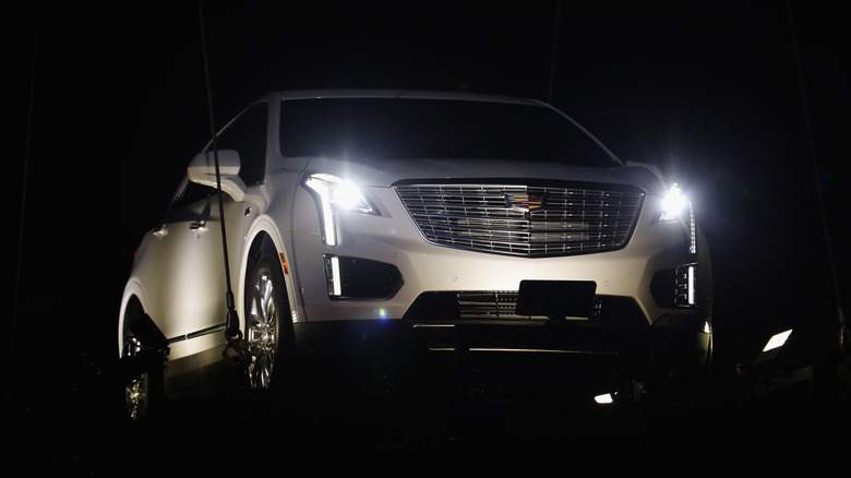 NEW YORK, NY - SEPTEMBER 09: A car is seen flying at the Cadillac announcement of partnership with Public School to unveil Pre-Fall Collection in Dubai alongside All-New Luxury Crossover, The XT5 on September 9, 2015 in New York City. (Photo by Brian Ach/Getty Images for Cadillac)
