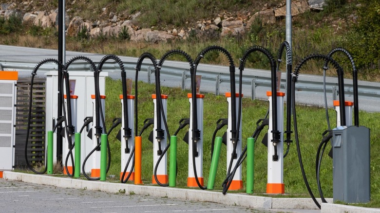 A charging station by some grassy terrain