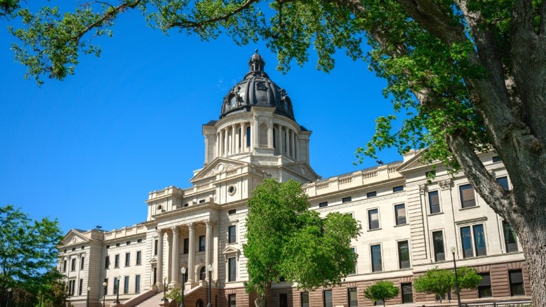 The South Dakota State Capitol building with a clear blue sky in the background