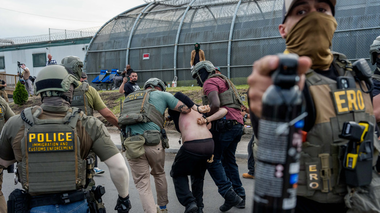 AY 26: Federal agents detain a protestor outside the federal immigration center at Delaney Hall in Newark, where ICE is housing detained immigrants on May 26, 2026 in Newark, New Jersey. The protests, which have become tense over the holiday weekend, come amid reports of an ongoing hunger strike by detainees.