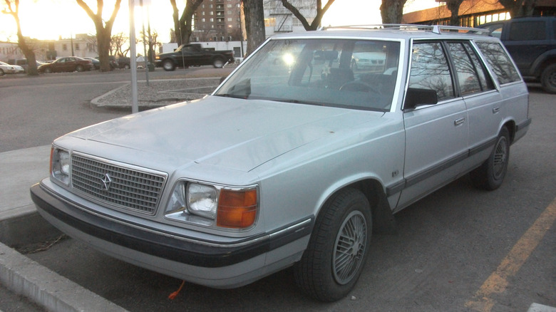 A gray Plymouth Reliant station wagon