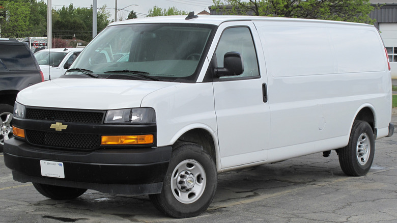 a white 2021 Chevrolet Express 2500 WT Cargo photographed in Sudbury, Ontario, Canada.