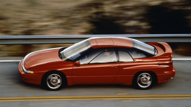 Side shot of a red Subaru SVX