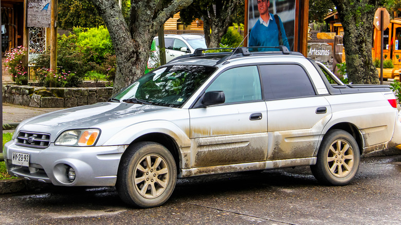 Side shot of a silver Subaru Baja