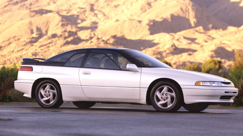 Side shot of a white Subaru SVX