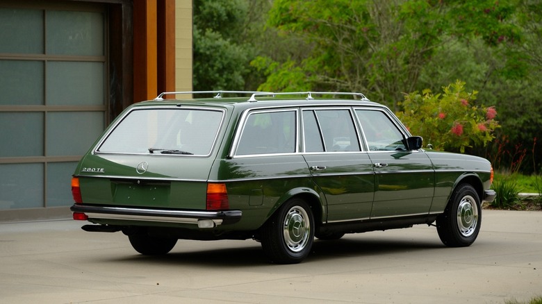 Rear 3/4 view of a green 1979 Mercedes-Benz 280TE