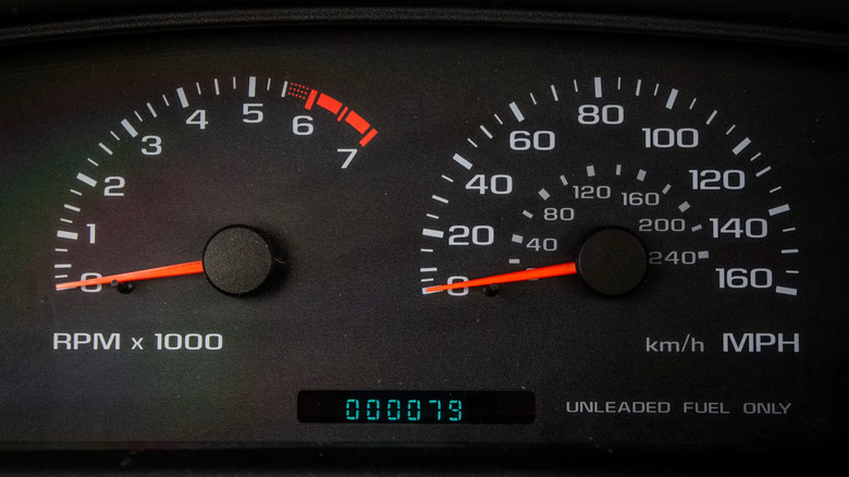 The instrument panel of a 1996 Chevy Impala SS showing 79 miles on the odometer