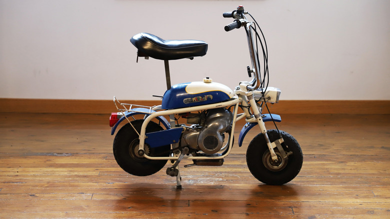 Side view of white and blue 1969 Ducati Mini Marcellino minibike