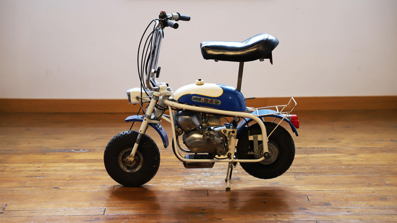 Side view of white and blue 1969 Ducati Mini Marcellino minibike