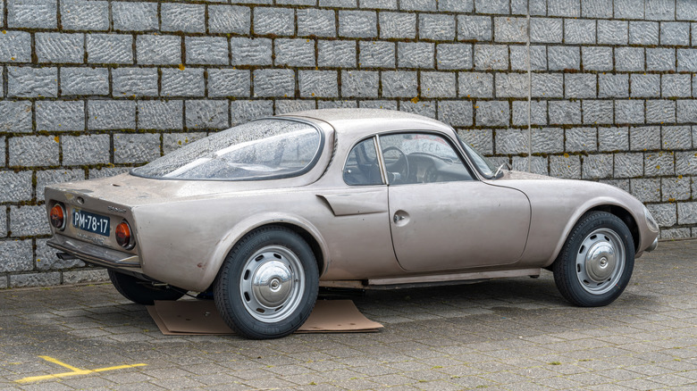 Rear and side view of a gray, patinated Matra Djet