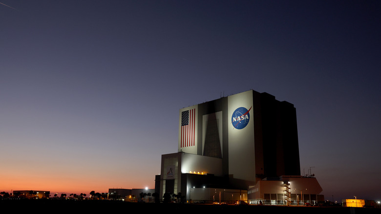 A view of NASA's Vehicle Assembly Building during low light