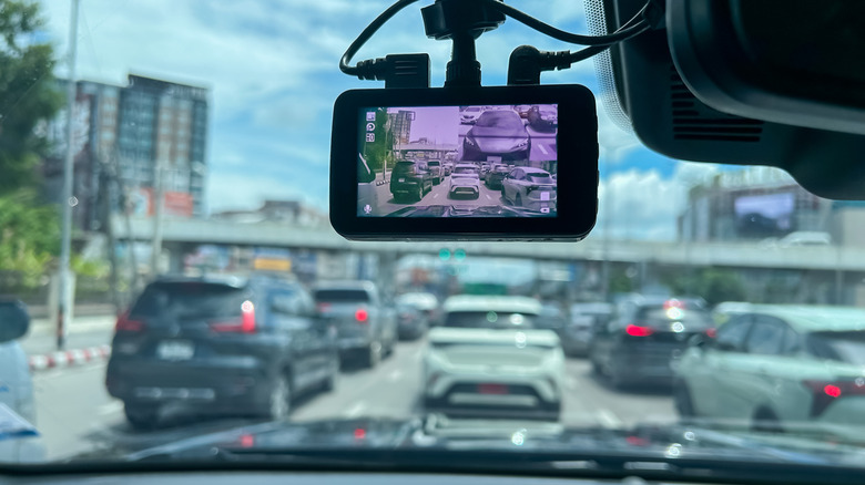 A vehicle equipped with a dashboard camera stopped in traffic
