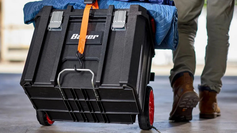 Person is shown hauling Harbor Freight's modular rolling box