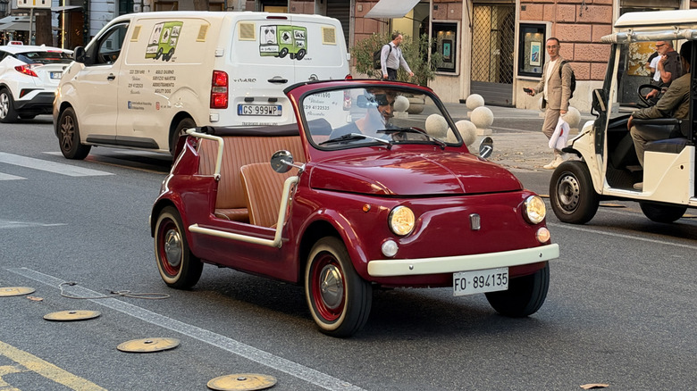 Front 3/4 view of a red Fiat 500 Jolly