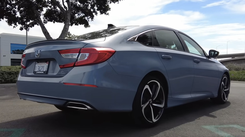 A rear three-quarter view of a 2021 Honda Accord